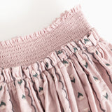 Skirt bottom: smock-waisted waist and patterned rows with green flowers