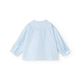Light blue shirt with short sleeves and a round neckline on the back.