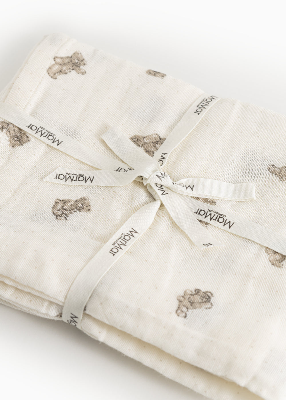 Soft cream with teddy bear print and Mamar brand at the fold