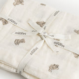 Soft cream with teddy bear print and Mamar brand at the fold