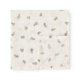 Stuffed 2-pack folded square in cream with repeated teddy bear print.