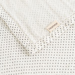 Stainless steel with small black dots and white edge, MarMar logo on the fold.