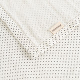 Stainless steel with small black dots and white edge, MarMar logo on the fold.