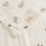 Baby ones in cream with teddy bear print, stitching and Marmar label