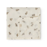 Baby ones in cream with small teddy bear print and folded edge.
