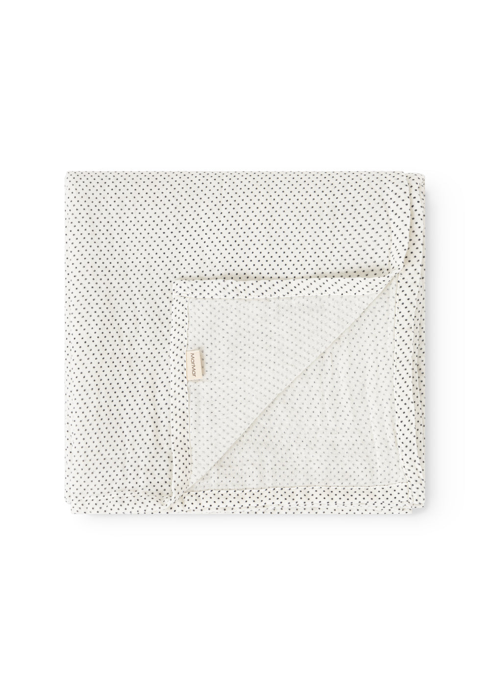 Cream blanket with small black dots, folded square, with a marMar flap.