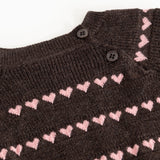 Sort striped blouse with pink hearts and buttons at the neckline.