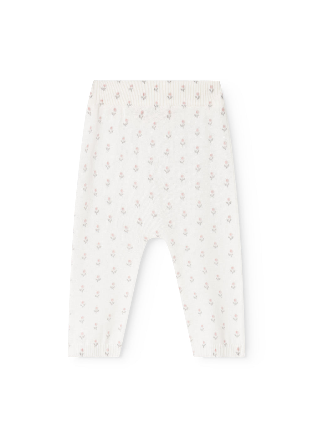 Skinny jeans with light hem and floral pattern, fitted leg and elastic waist.