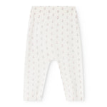 Skinny jeans with light hem and floral pattern, fitted leg and elastic waist.