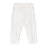 Skinny jeans with light hem and floral pattern, fitted leg and elastic waist.