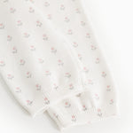 Elastic rib-closed leggings with small floral pattern at the bottom.