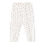 Floral printed leggings with a light base, small floral motifs, elastic waistband and legs.