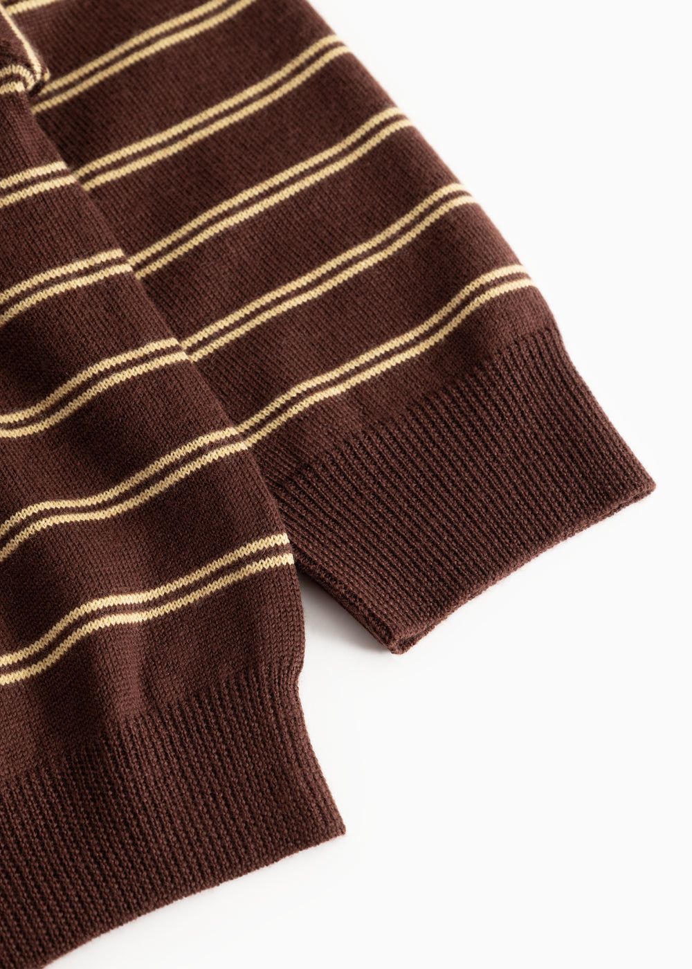 Dark brown striped knit polo with ribbed cuffs and collar edges