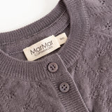 Dark purple knitted cardigan with ribbed edge, two buttons and a label.