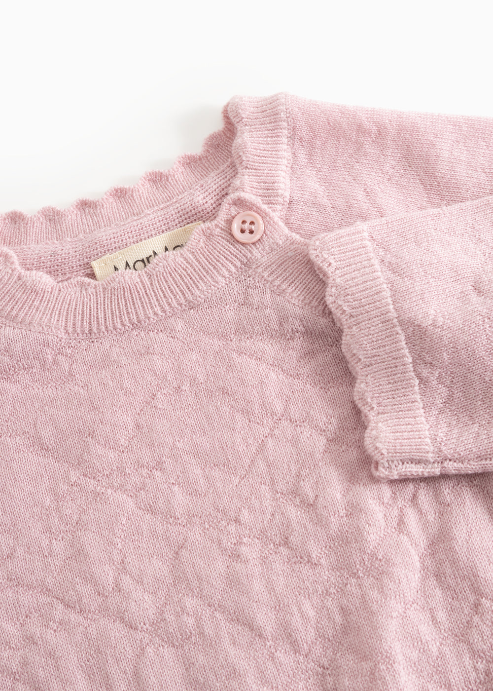 Pink knit cardigan with high collar, button closure, and fine textured pattern.