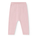 Pink knit trousers with elastic waist and relaxed fit.
