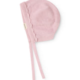 Pink knit cap in knit with wave edge and two drawstrings