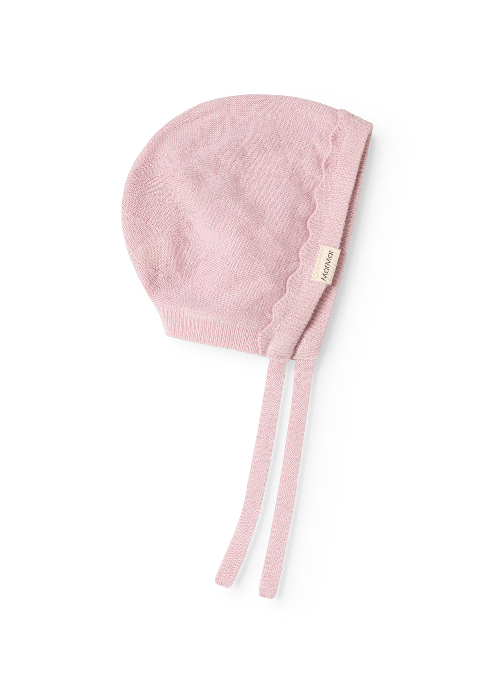 Pink knit cap in knit with ribbed edge and two long drawstrings.