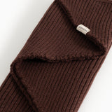 Dark wine-red knitted scarf with folded edge and Marmar label.