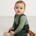 Long-sleeved bodysuit in frost green ribbed fabric for child, long sleeves and romper style