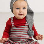 Gray and red striped romper with wide straps, worn by baby
