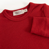 Red long-sleeve bodysuit with ribbed collar and label at neckline