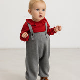 Gray melange suspenders pants with button closure and ribbed cuffs at the legs