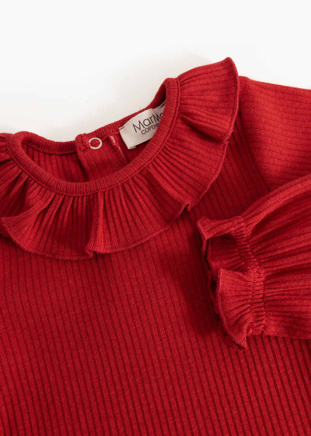 Cherry red ribbed bodystocking with ruffle collar and button closure at the neck.