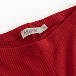 Red leggings for children with Miramar ClassicCare label on the waistband