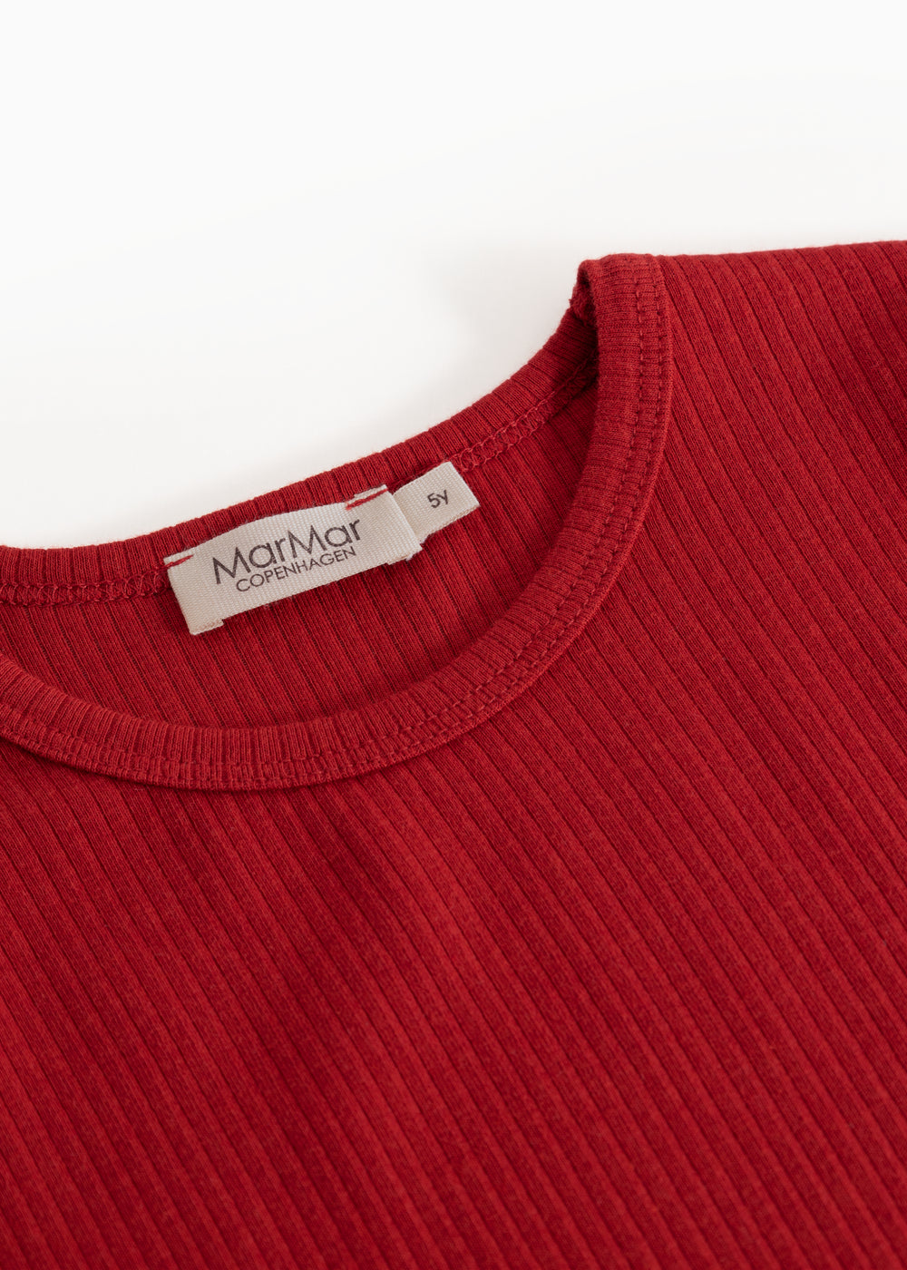 Red long-sleeved T-shirt with round neck and inner label