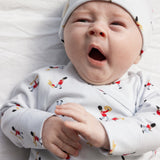 Newborn white baby hat with musician pattern