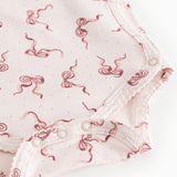 Belita bodystocking with snap buttons at the crotch and bow print