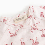 Blouse with ruffled collar and button at the neck, seahorse print