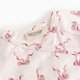 Blouse with ruffled collar and button at the neck, seahorse print