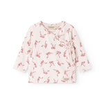 Pink blouse with seahorse pattern, long sleeves and wrap neckline with button band