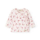 Pink blouse with seahorse pattern, long sleeves and wrap neckline with button band