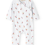 White jumpsuit with long sleeves and musician print all over.
