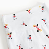 White pants with detailed musician print all over the fabric