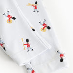 White baby pants with musician print and visible seam at leg opening