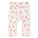 Light-colored baby pants with red bow pattern and leg hole