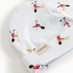 White baby hat with musician pattern and MarMar label