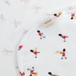 White rug with musician print, rounded edge and label tag