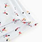 White rug with musician print and double-stitched edge