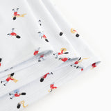 White rug with musician print and double-stitched edge