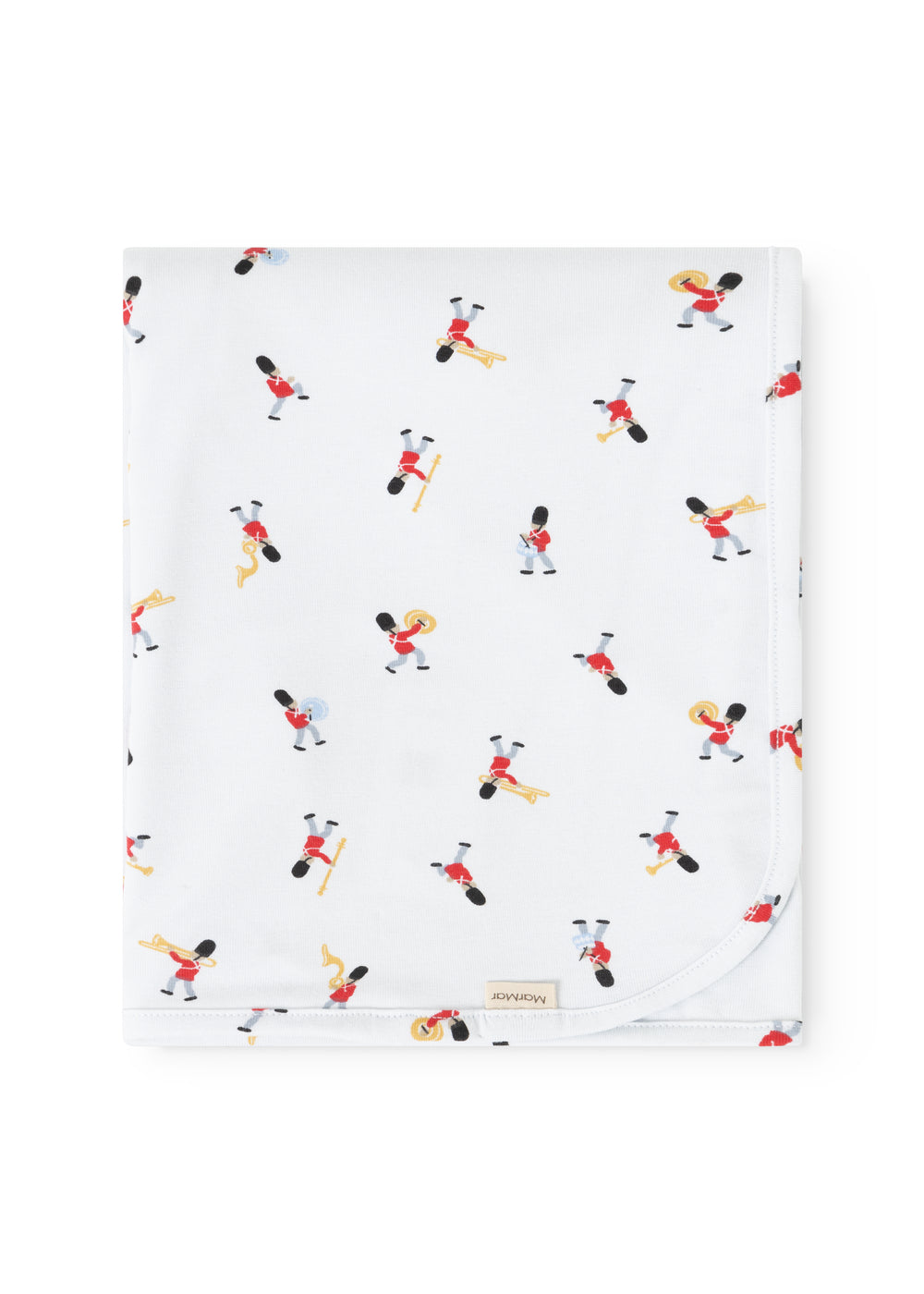 White rug with colorful musician figures in a repeated pattern