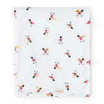 White rug with colorful musician figures in a repeated pattern
