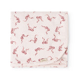 Rug folded as a rectangle, pink bow pattern on light background, seam edges