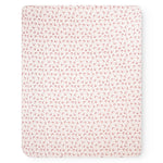 Square rug with light and red bow pattern, uniform throughout.