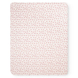 Square rug with light and red bow pattern, uniform throughout.