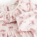 Riva dress, close to neck and sleeve edge with bow print and ruffles